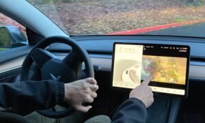 A feature called “Passenger Play” allowed video games to be played on Tesla vehicles’ center touch screens while the car is in motion