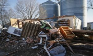 Debris from the public library in Rudd, Iowa, is seen on 16 December, after a tornado touched on the town. 