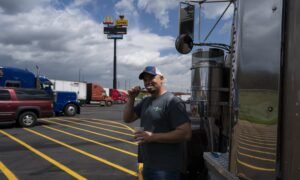Truck driver Sammy Lloyd in Virginia last year. Most truck drivers work 60 to 70 hours per week without overtime pay, according to Truckers Movement for Justice
