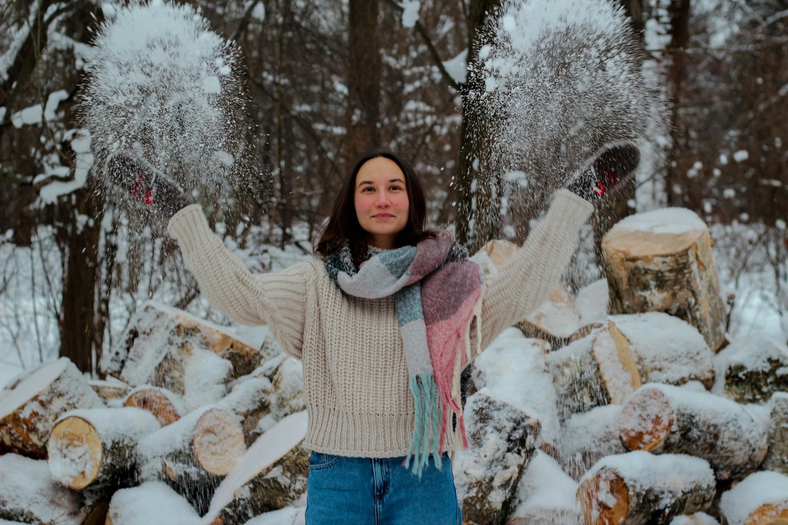 a girls wearing sweater in snow