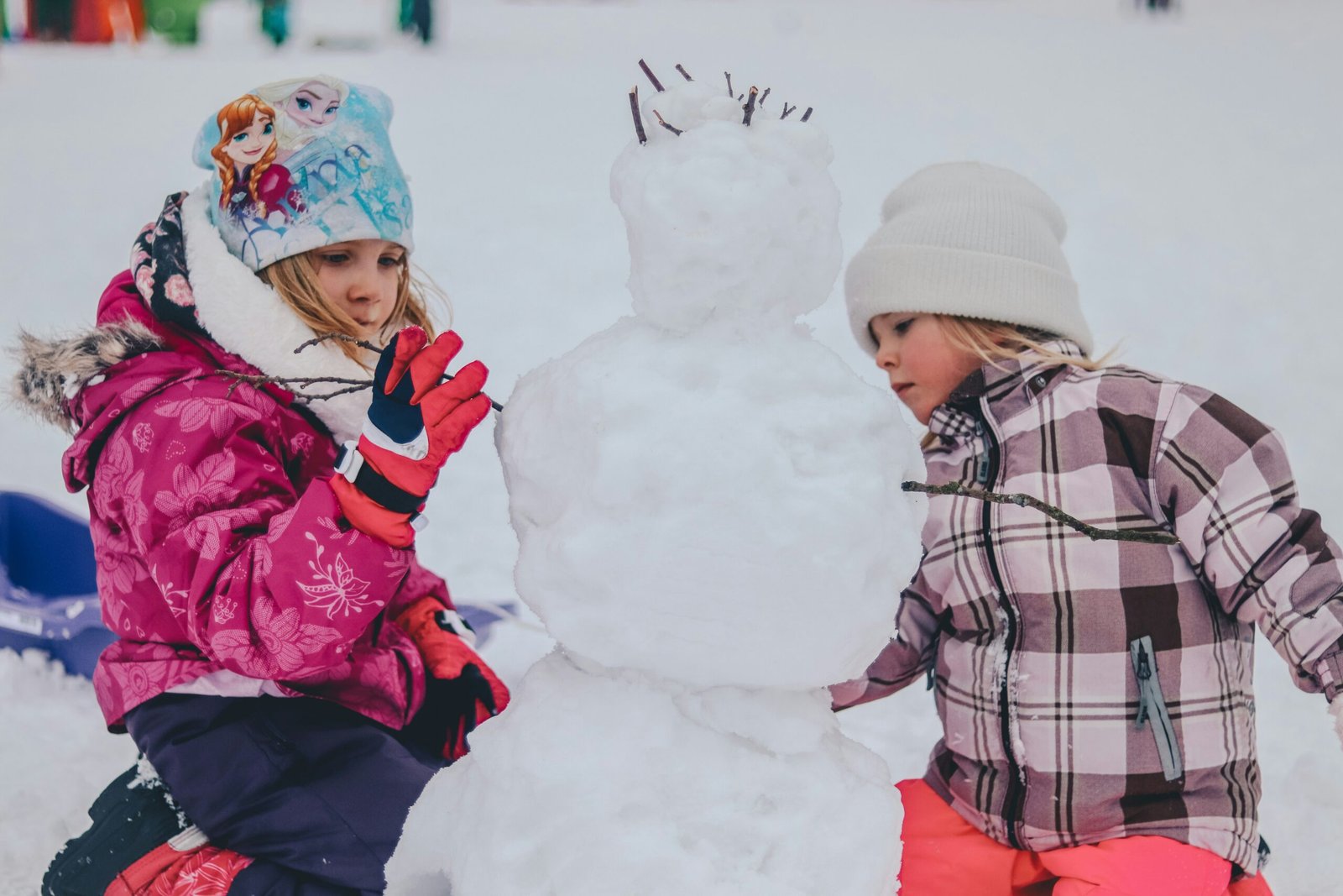 kids making snow man